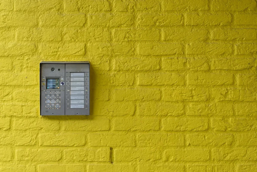 Home alarm system keypad mounted on a wall