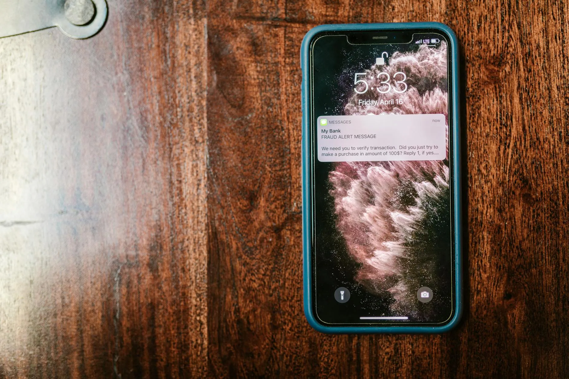 Smartphone displaying an alert notification on screen
