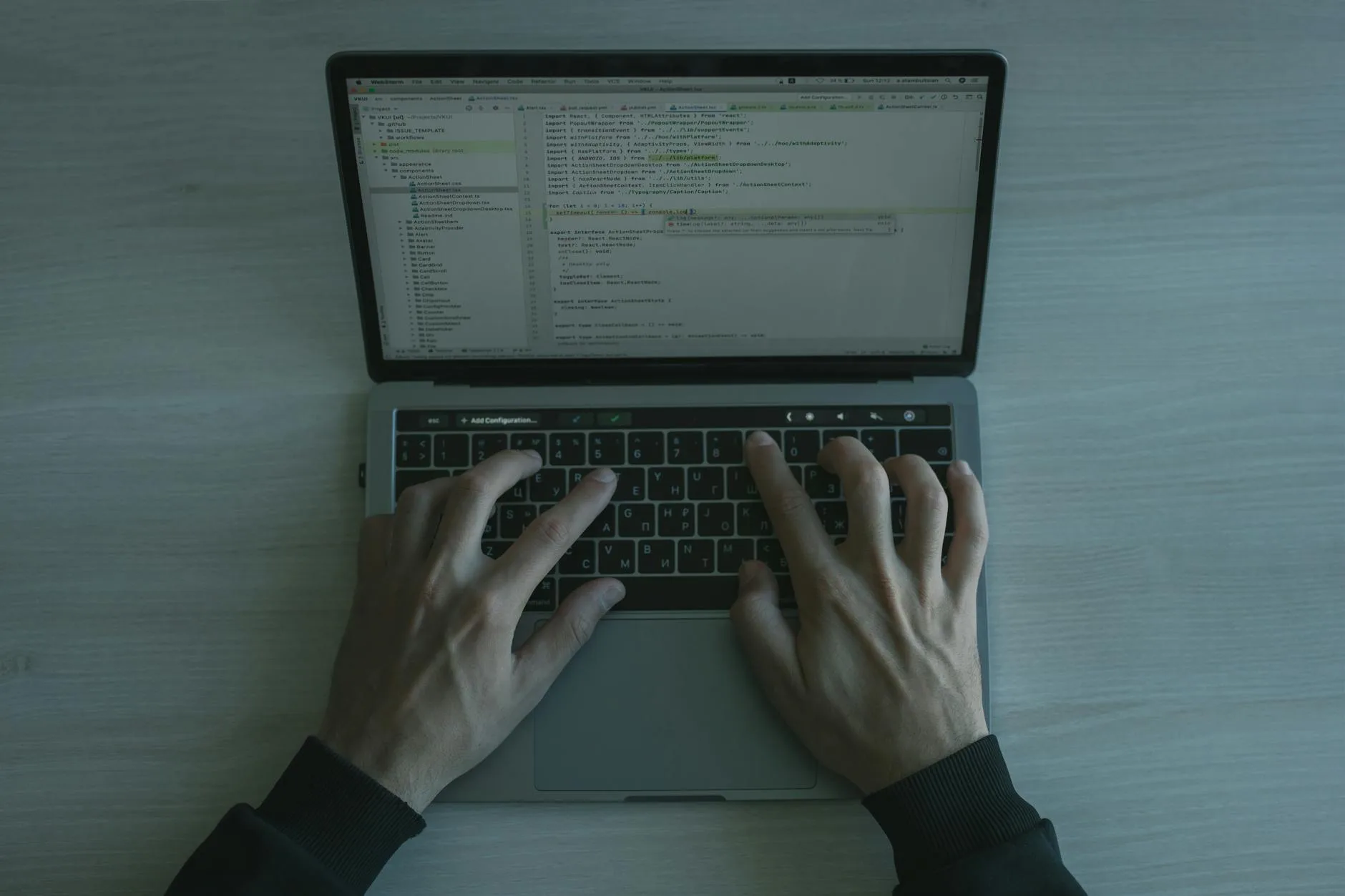 Person using laptop with security authentication screen
