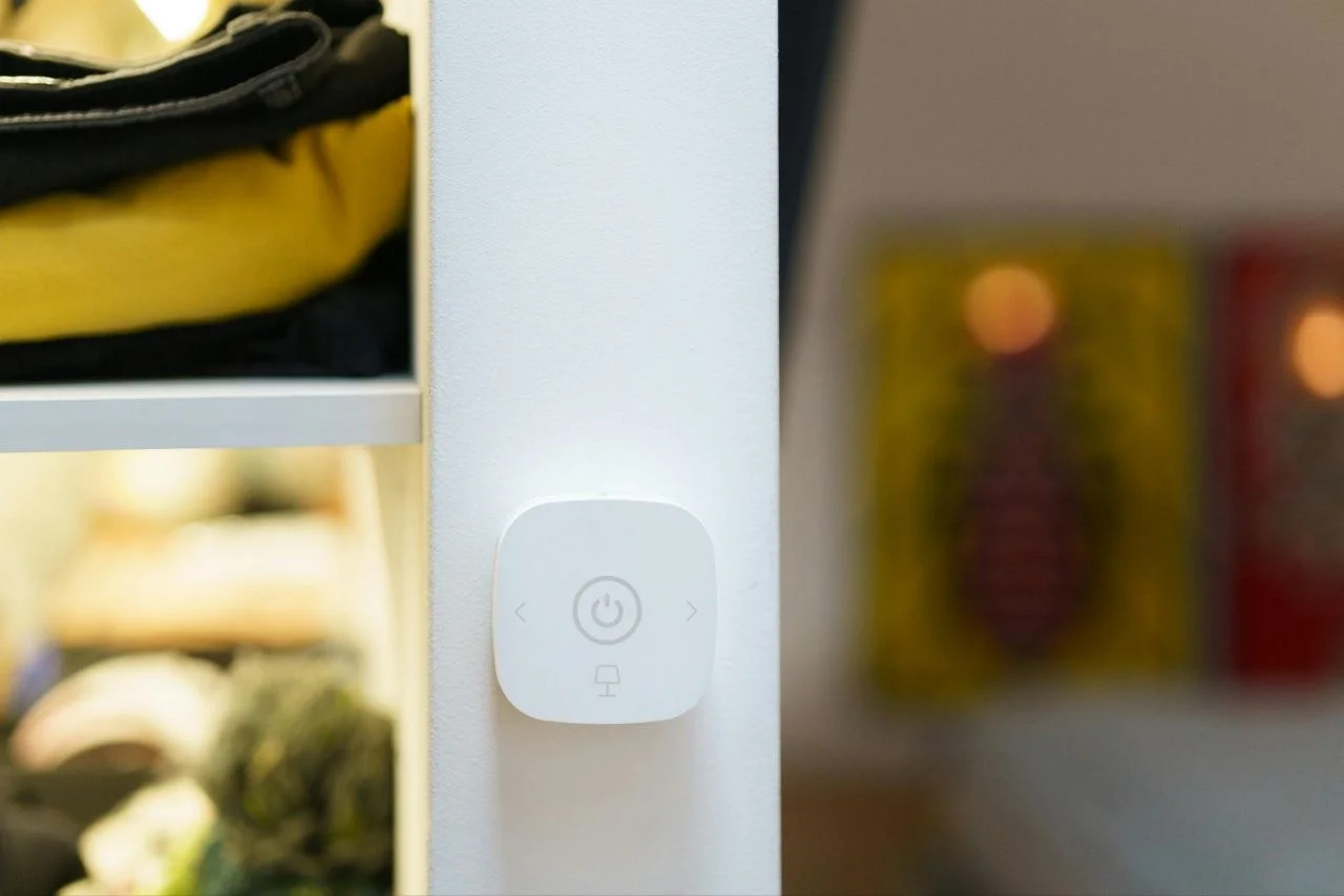 Wall-mounted smart light switch in a modern UK home